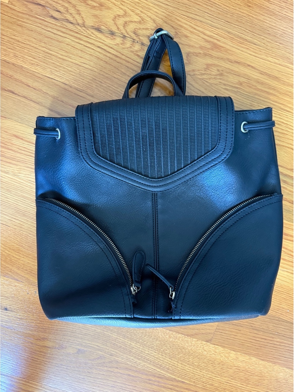 Black Faux Leather Backpack with Front Zip Pockets and Striped Interior Lining